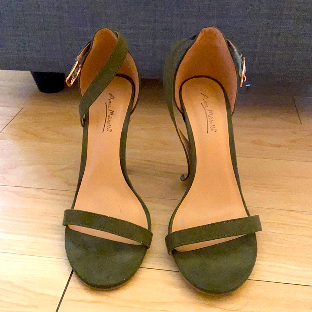 Use but great condition olive green strap heel!